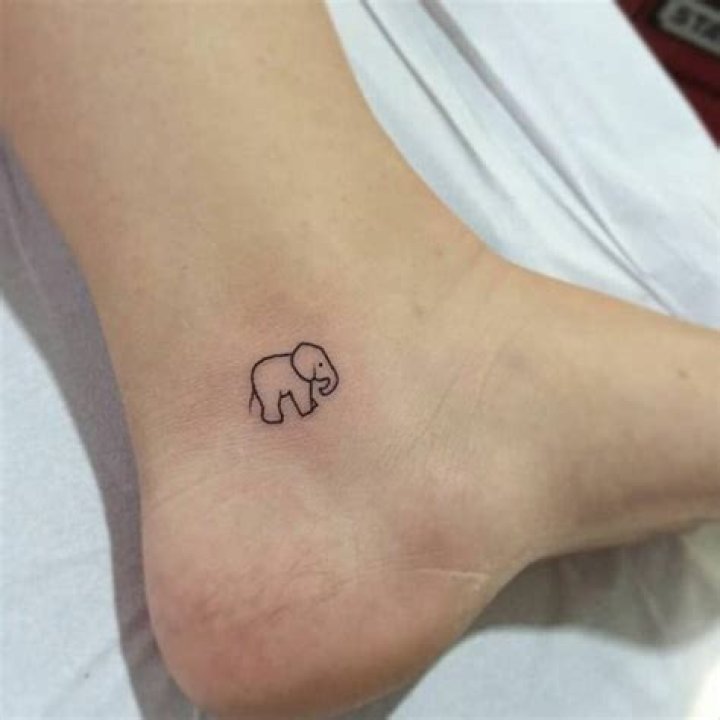 30+ Adorable Tiny Elephant Tattoos Spiritus Tattoo Tiny elephant tattoo, Family tattoos