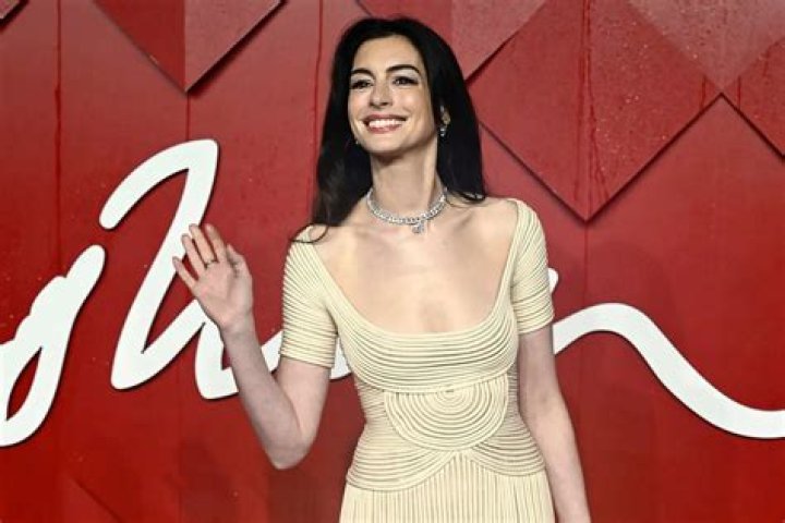 Anne Hathaway Avoids Wardrobe Malfunction with Relatable Dress Tweak in