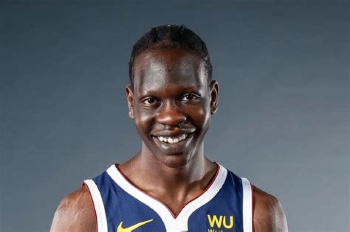 Bol Bol Parents Meet Manute Bol And Ajok Kuag