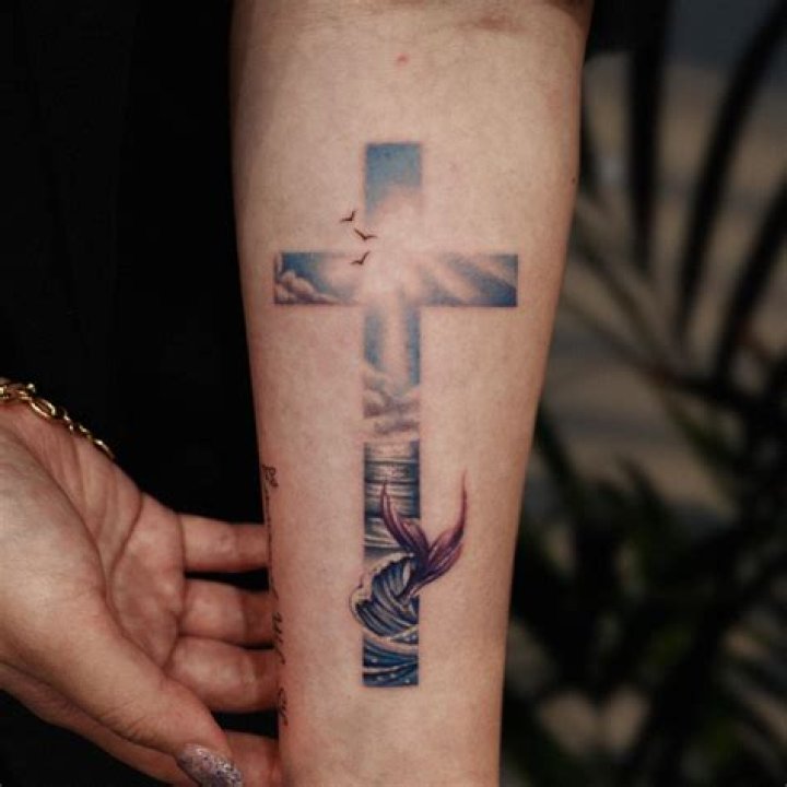 Brandi cyrus cross feather tattoo Tattoos Book 65.000 Tattoos Designs
