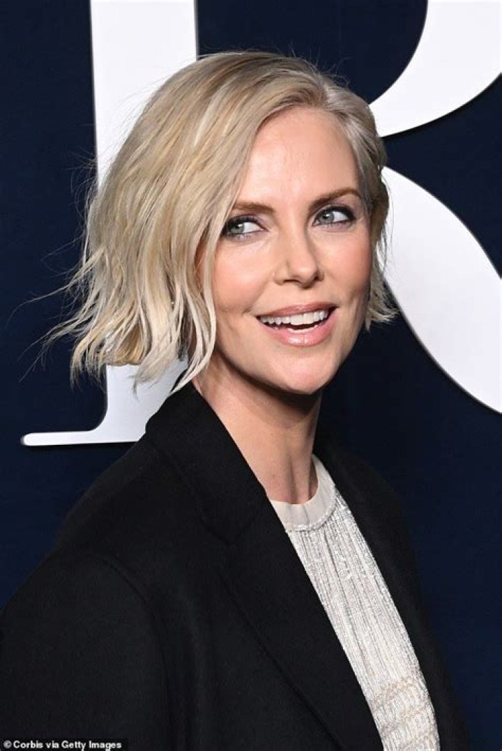Charlize Theron puts on a loving display with partner Sean Penn at