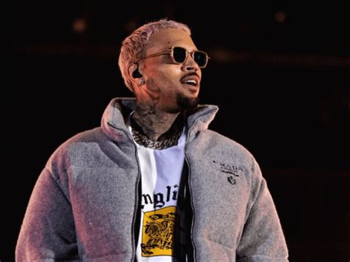 Chris Brown Cuddles Up To Baby Mama & Son In Rare Family Shot