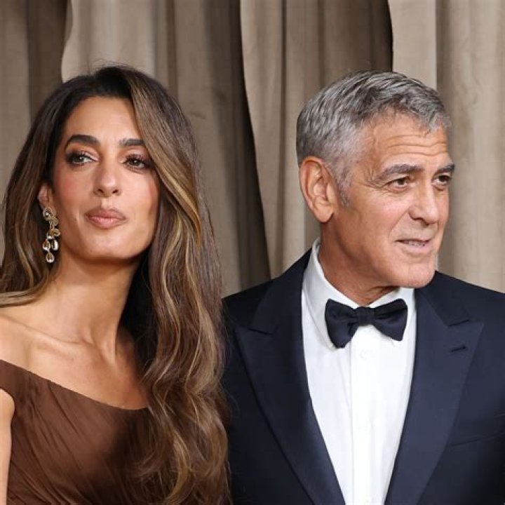 Clooney arrives in Edinburgh as he poses for selfies with fans