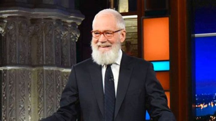 David Letterman in front of his pickup truck that he lived out of when