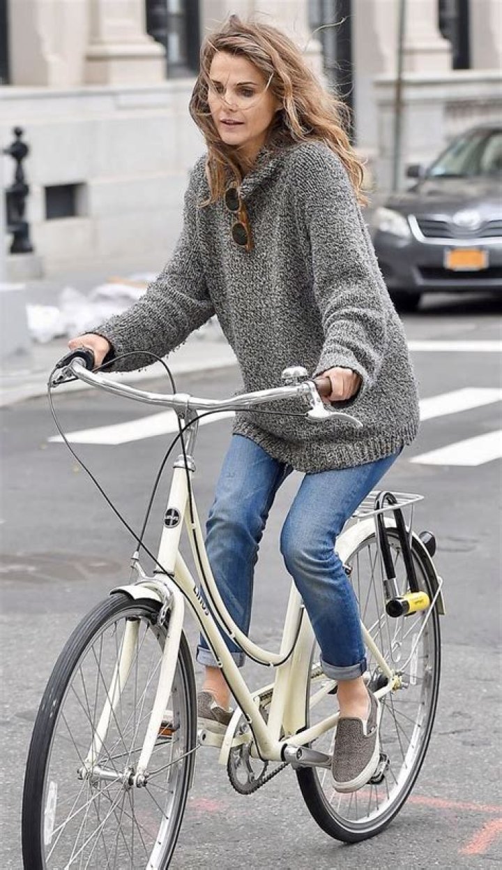 Doting mom Keri Russell links hands with kids on outing for breakfast