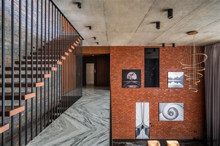 Exposed Brick and RCC creating Compositional Structure of the Residence