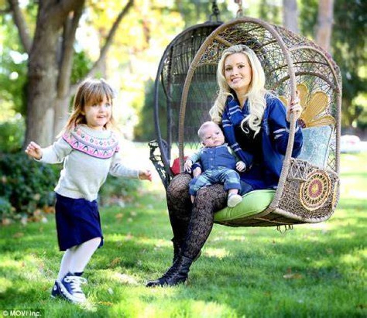 Holly Madison kisses newborn son Forest as she takes touching family