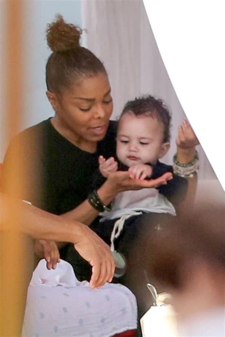 Jackson pictured feeding her baby son Eissa in Miami Beach, Florida