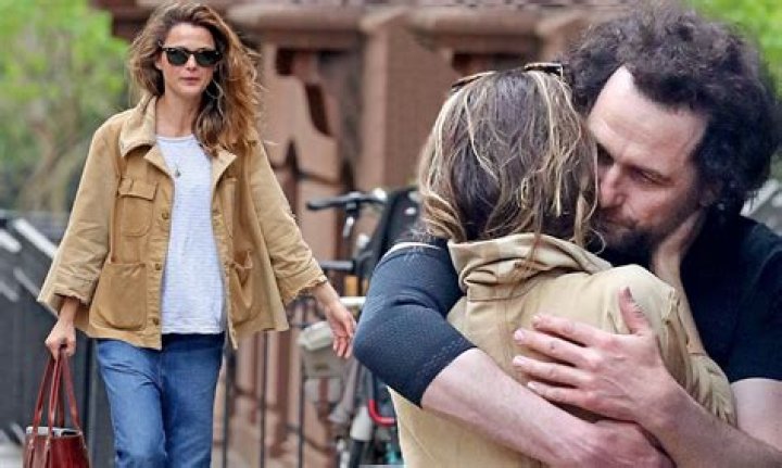 Keri Russell affectionately kisses Matthew Rhys before heading out