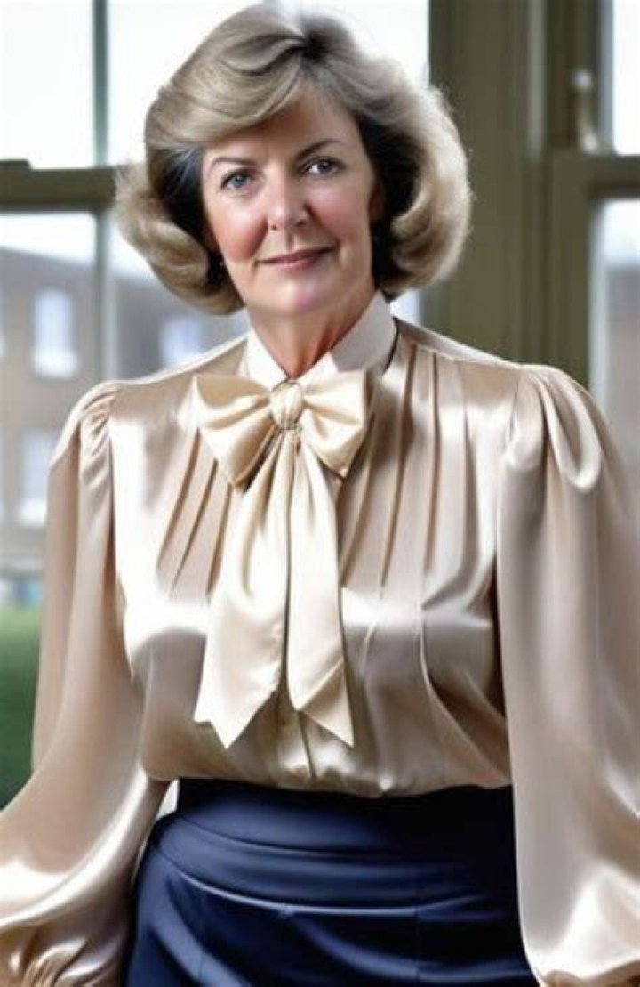Ladies in Satin Blouses Mary McDonnell purple satin blouse