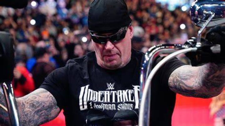 Legendary Wrestler The Undertaker Scares Off Shark at Beach, Impresses