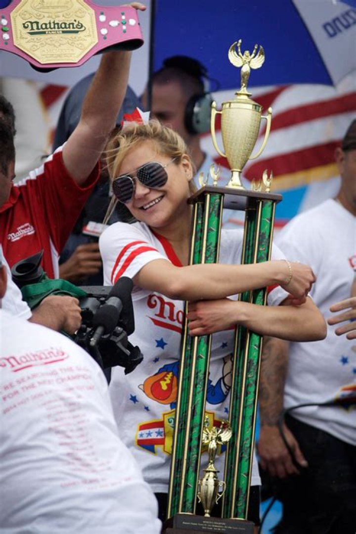 Novice Female Competitive Eater Takes On InNOut 50x50 Challenge Like A Pro