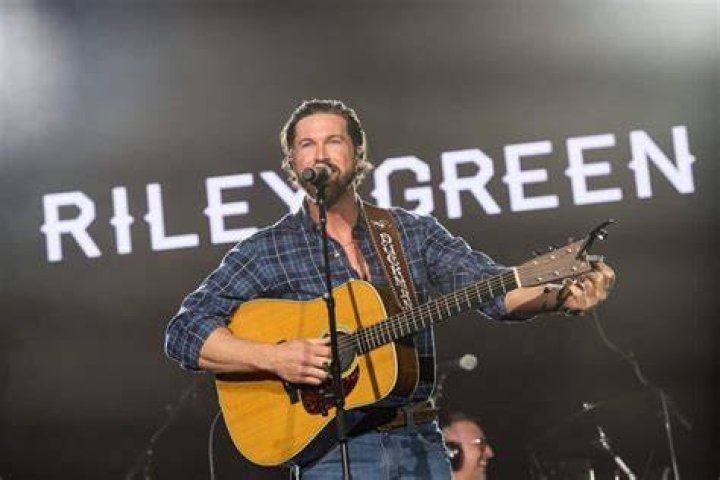 Riley Green Brings Music City to Belize for 'In Love By Now' Video