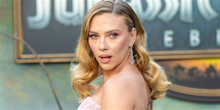 Scarlett Johansson wearing Celine by Hedi Slimane walks the red carpet