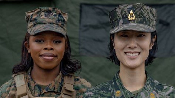 These 2 female Marines are in the brig on assault charges. Both claim
