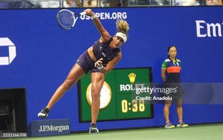 U.S. Open women's singles tennis champion Iga Swiatek poses at "Top of