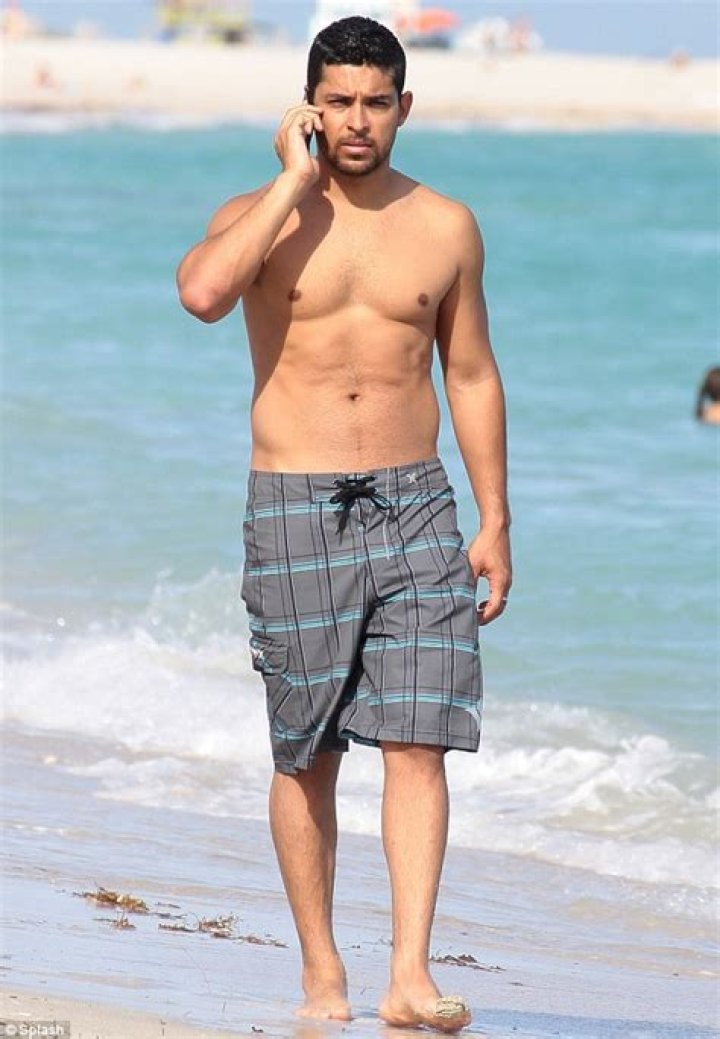 Wilmer Valderrama shows off his toned torso as he goes for a shirtless jog with a pal in LA